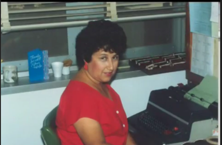 Gloria Torres in an undated photo using an IBM Selectric typewriter.