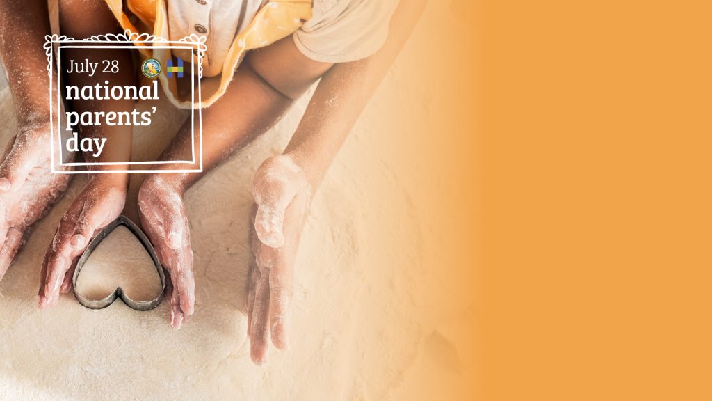 National Parents Day hands making hand made heart shaped cookie