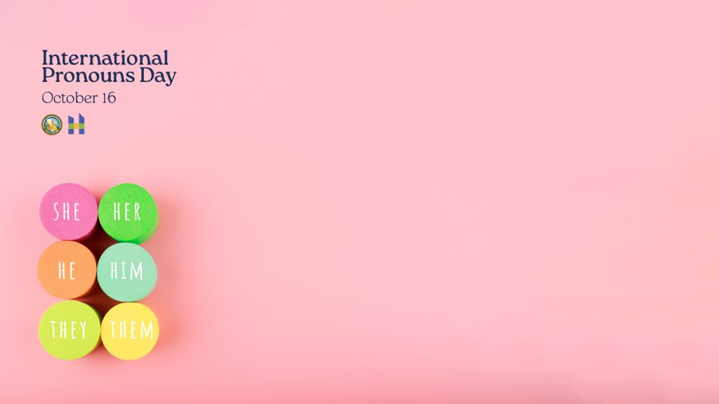 International Pronouns Day October 16. A pink background with multiple colors each with a different pronoun she her he him they them