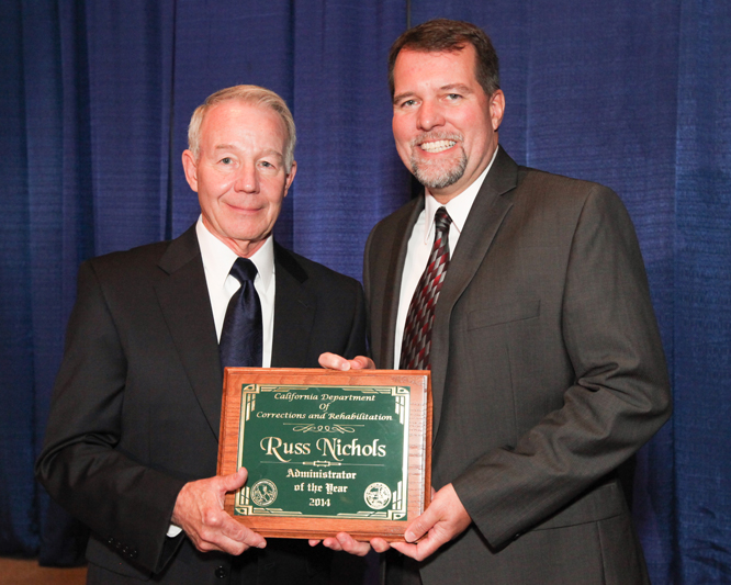 Russ Nichols with award.