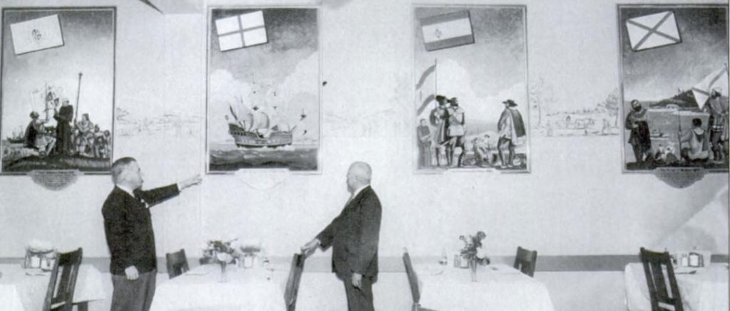 Two men admire murals in the officers' dining room at Folsom State Prison in the 1930s.