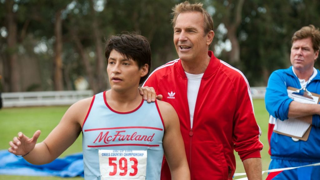 Movie still from "McFarland USA" by Disney showing three actors.