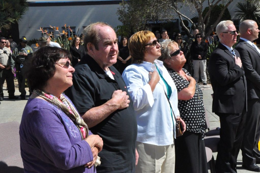 Gathered are Burchfield family members, Charlene Corby from CPOF, and CDW (A) John Curzon and Warden (A) Ron Davis.