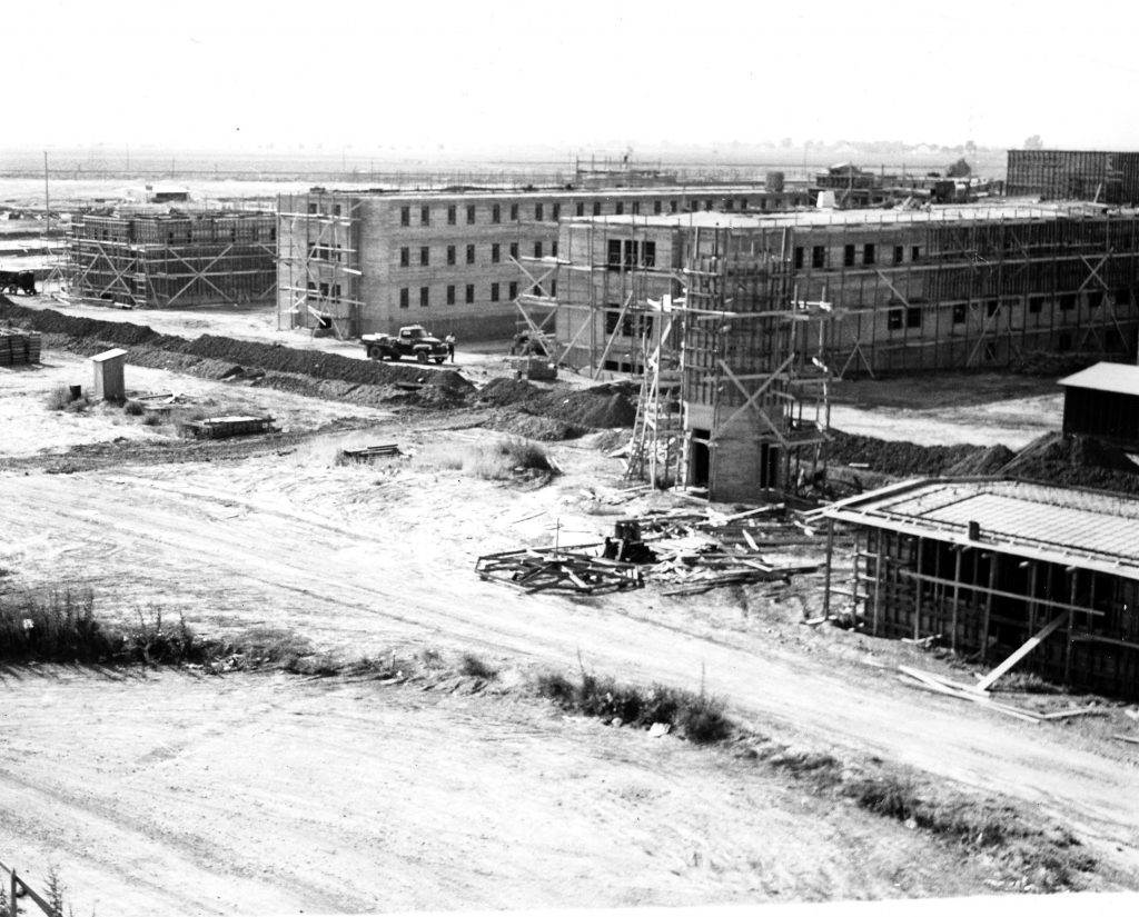 DVI history of prison buildings under construction.