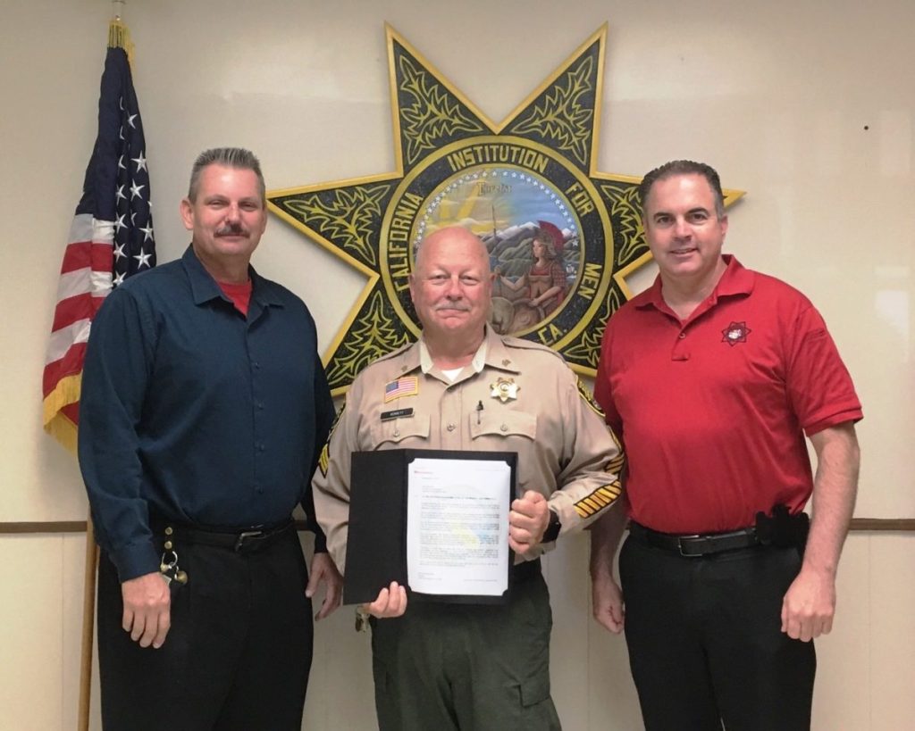 Correctional sergeant and two prison officials.