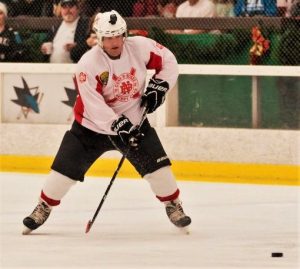 A CMF correctional officer plays hockey for charity.
