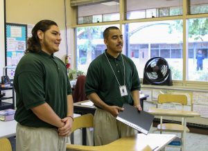 Two youth offenders share a project.