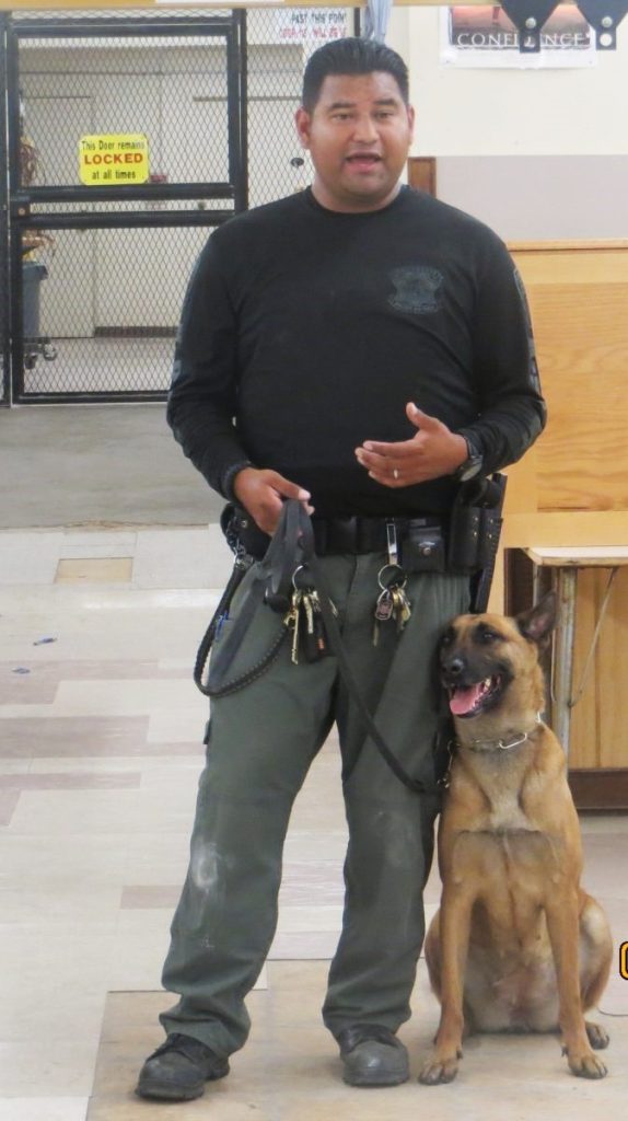 Officer Serrano and K-9 Goose.