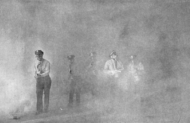 Training manual shows uniformed men emerge from foggy area.