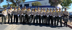Men and women in full uniform.