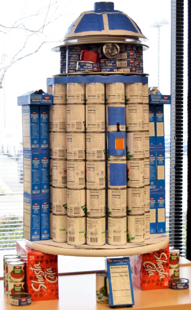 Cans are stacked like R2-D2 from Star Wars.
