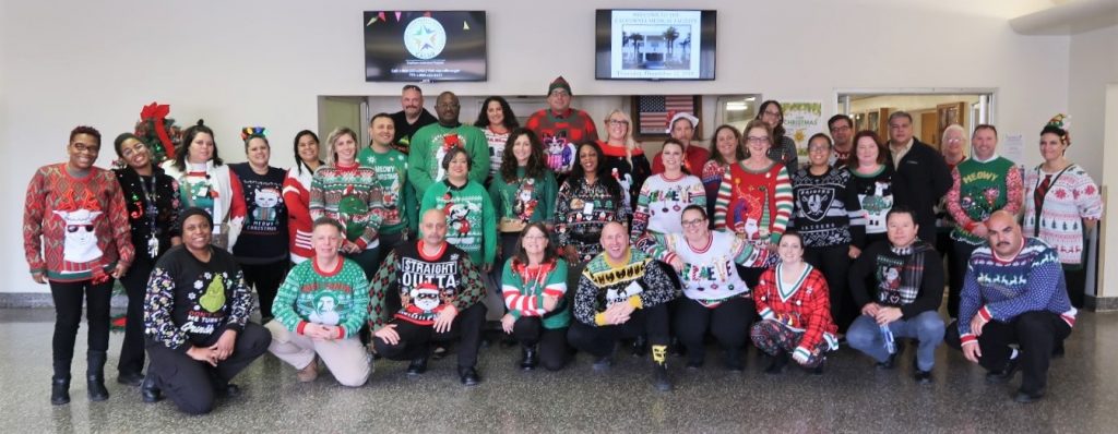 Prison staff wear ugly Christmas sweaters.