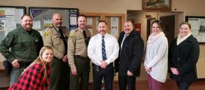Correctional staff, some sporting mustaches.