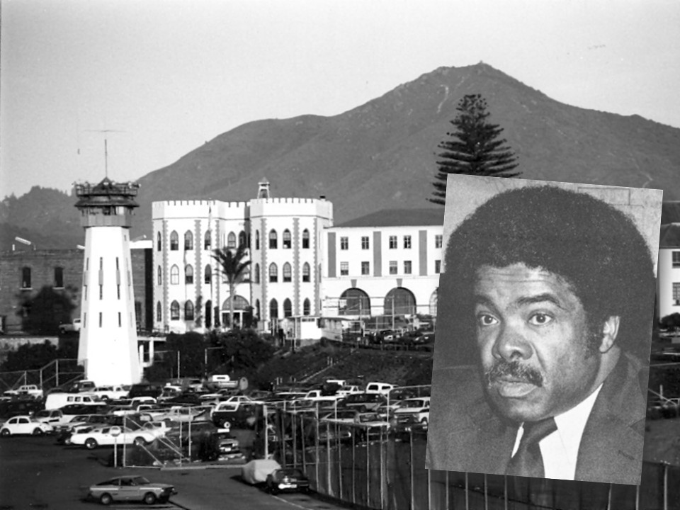 Photo of a man superimposed over San Quentin State Prison.