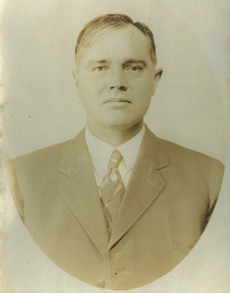 Folsom prison guard killed in Thanksgiving Day riot at Folsom Prison is shown in this grainy photograph. He's wearing a jacket and tie.