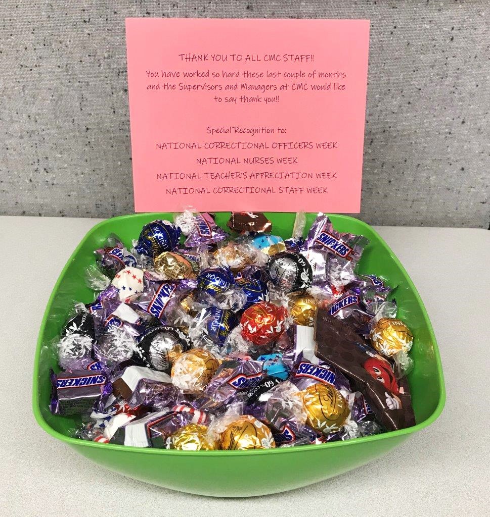 Candy bowl and a note that says "thank you to all staff."
