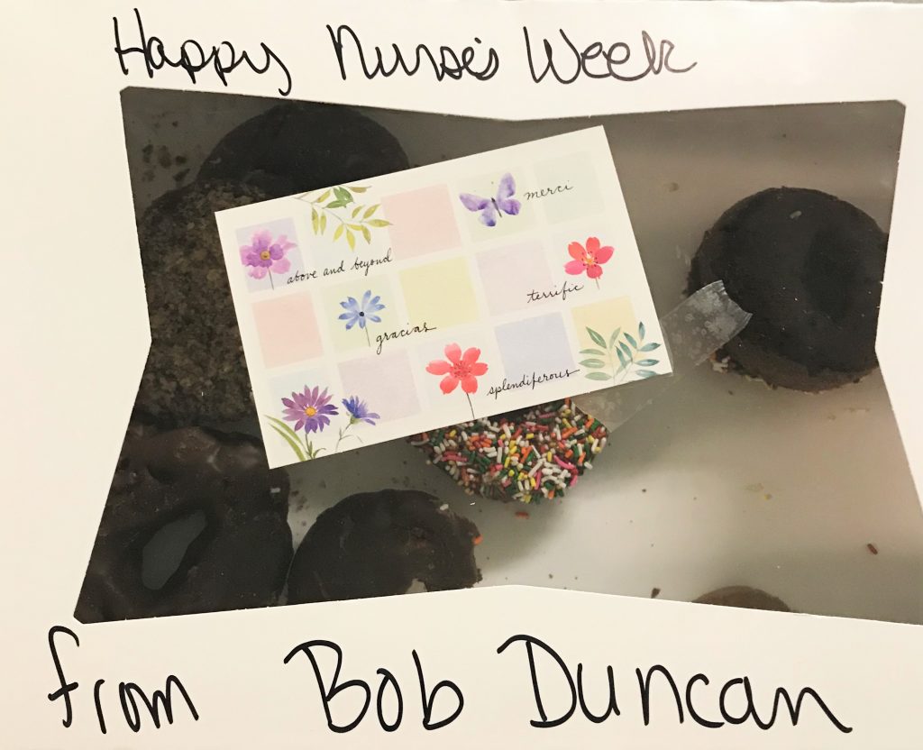 Donuts in a box with the words Happy Nurses Week from Bob Duncan.