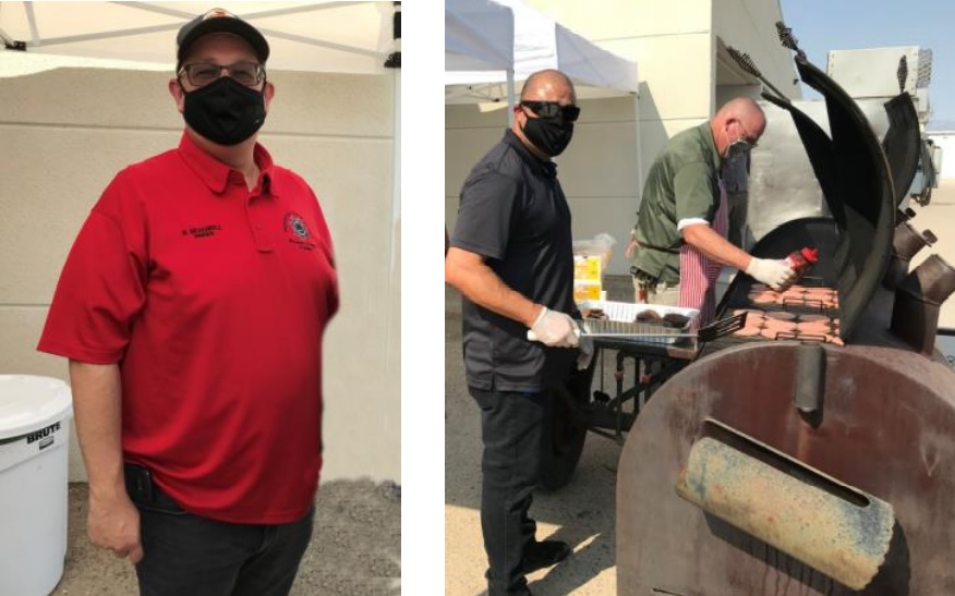 Ironwood prison staff flip burgers at a grill.