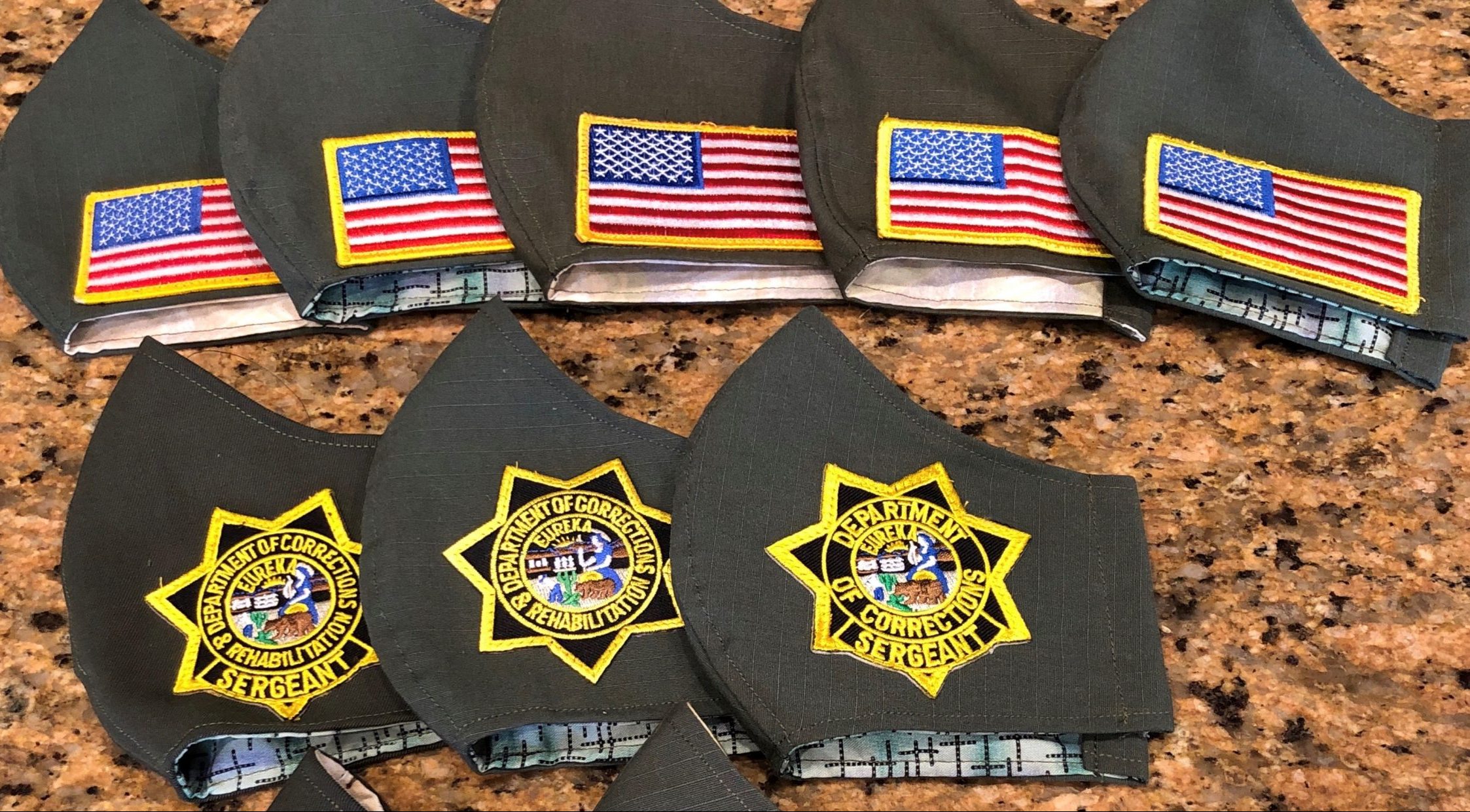 Masks with CDCR logos and American flags.