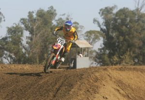 Correctional Officer Ronald De Jesus rides the track at the 2020 Fire Police Motocross races.