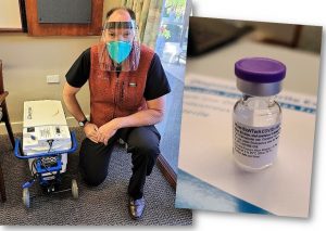 San Quentin State Prison RN Douglas Long helps administer COVID-19 vaccine.