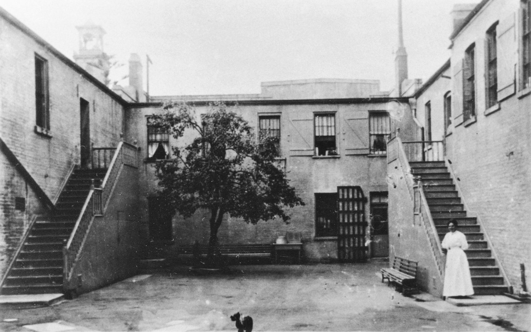 Early female prison staff supervised women at San Quentin, like in this early courtyard image.