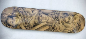 Avenal prison painted skateboard featured three portraits.