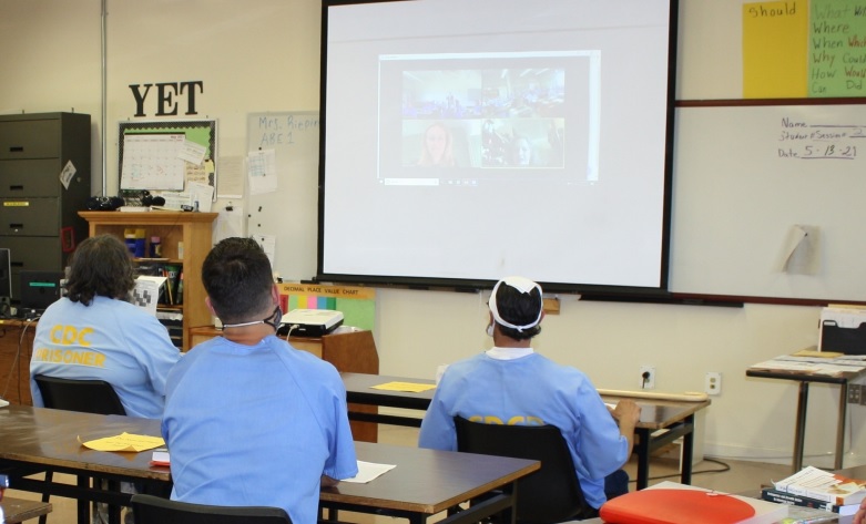 CDCR 2021 Valley State Prison students look at a video screen.
