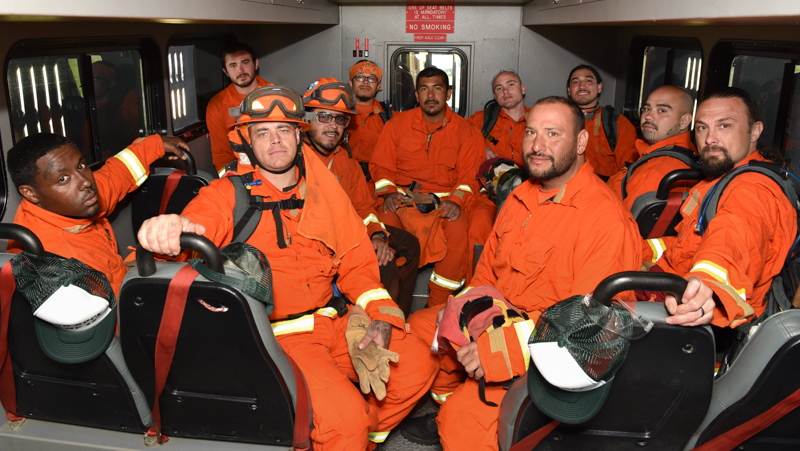 High Rock incarcerated firefighters in an emergency transport vehicle.