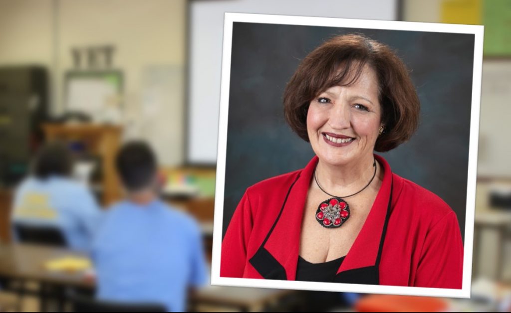 Correctional education classroom with photo of superintendent superimposed.