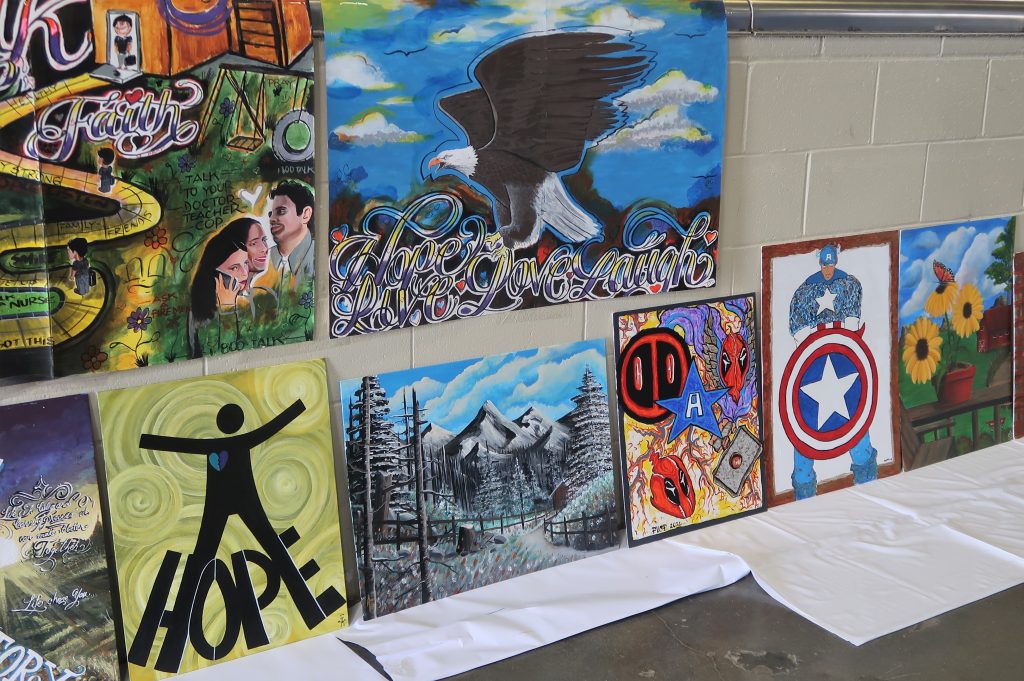 Suicide prevention event features inmate artwork.