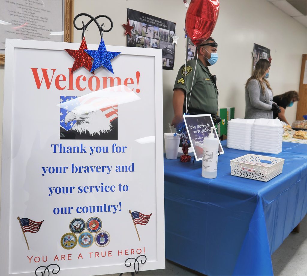 Pleasant Valley prison sign welcomes veterans for a luncheon.