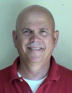 Robert Lozano smiling.