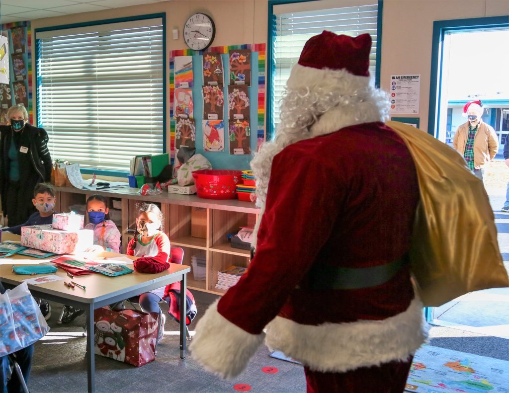 Santa visits a classroom.