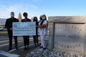 Sacramento prison staff and check to Stand Up Placer.