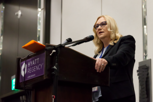 CDCR secretary speaking from a lectern.