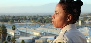 Retired Warden Cynthia Tampkins looks over California Rehabilitation Center.