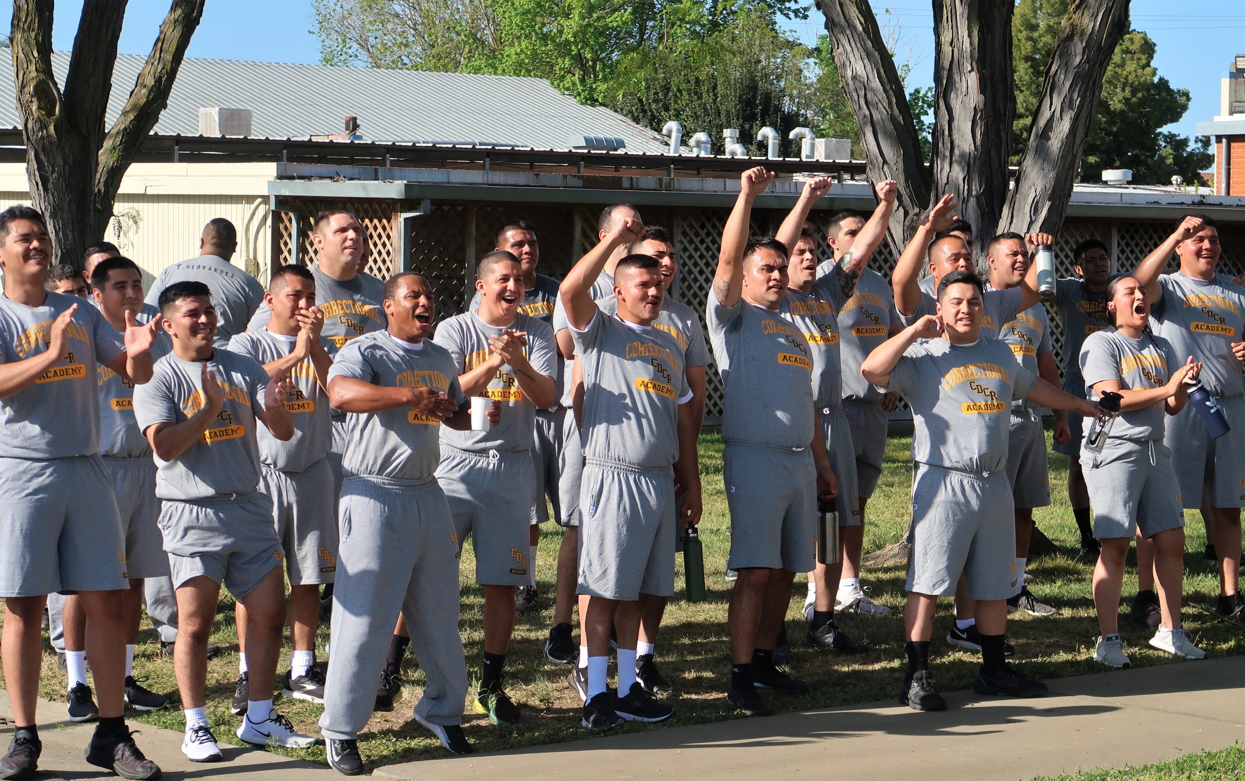 CDCR academy cadets cheer others.