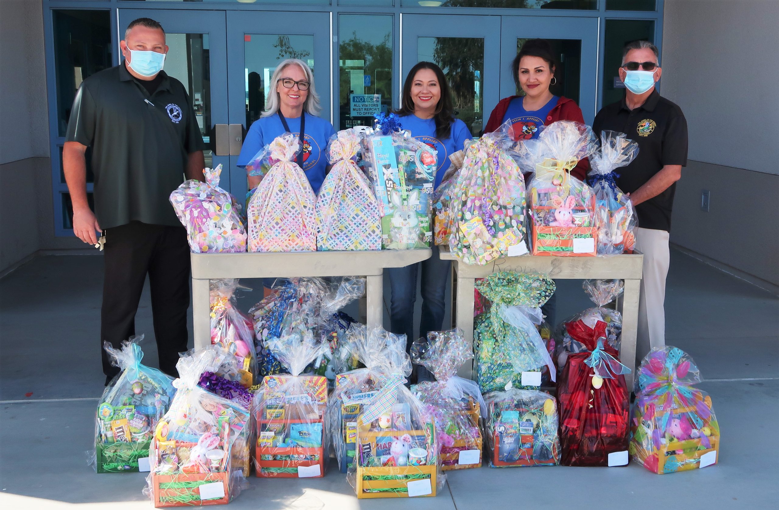 CVSP staff donate Easter baskets to an elementary school.
