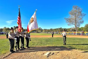 MCSP Honor Guard at little league baseball diamond.