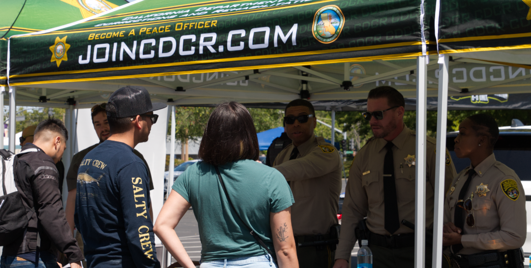 Law enforcement career fair CDCR booth.
