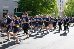 Runner in torch run for Special Olumpic.