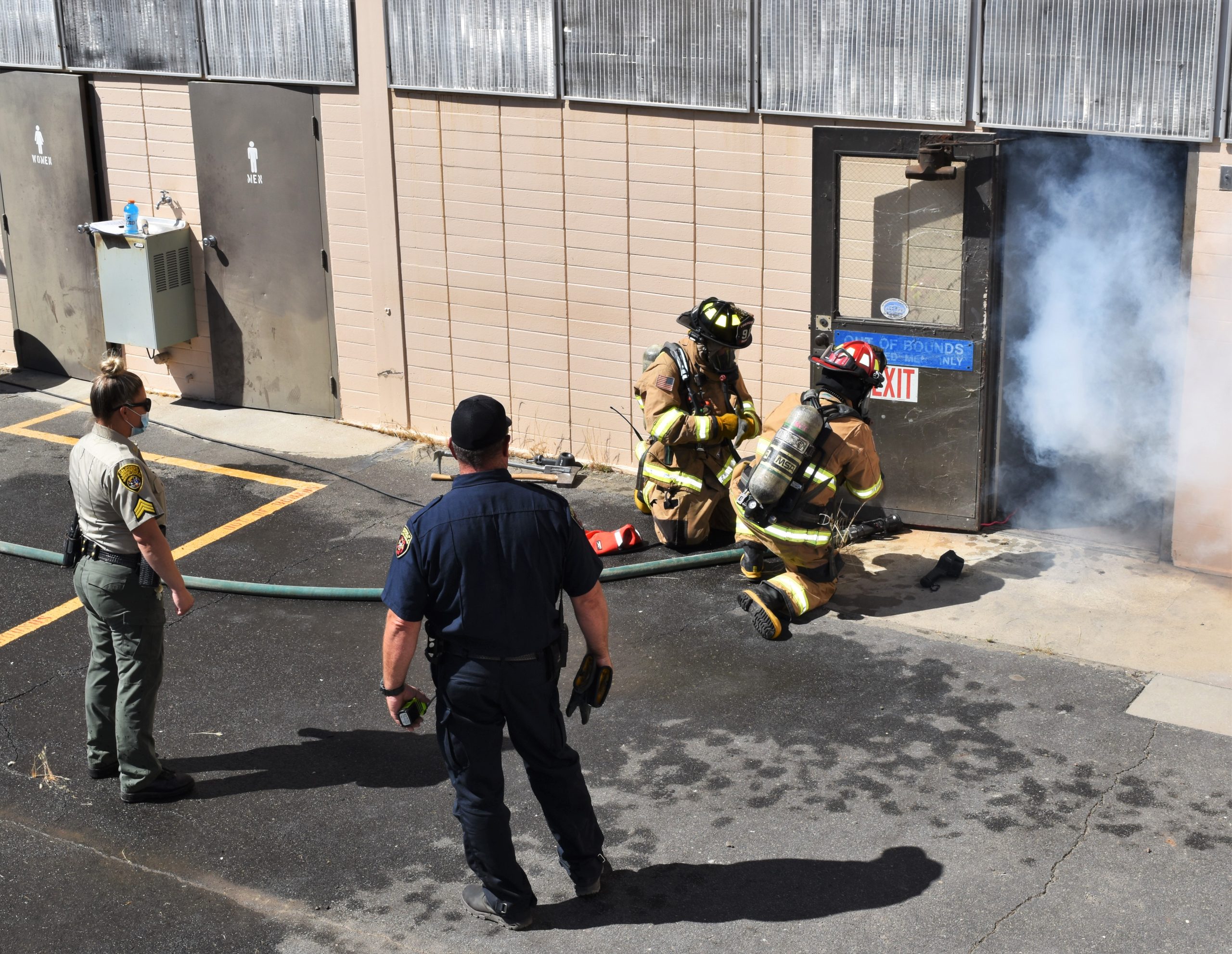 Disaster training for a fire with four staff from various agencies.