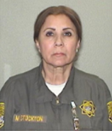 Female correctional officer Mary Ann Stockton in uniform.