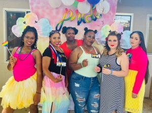Six women in colorful clothing.