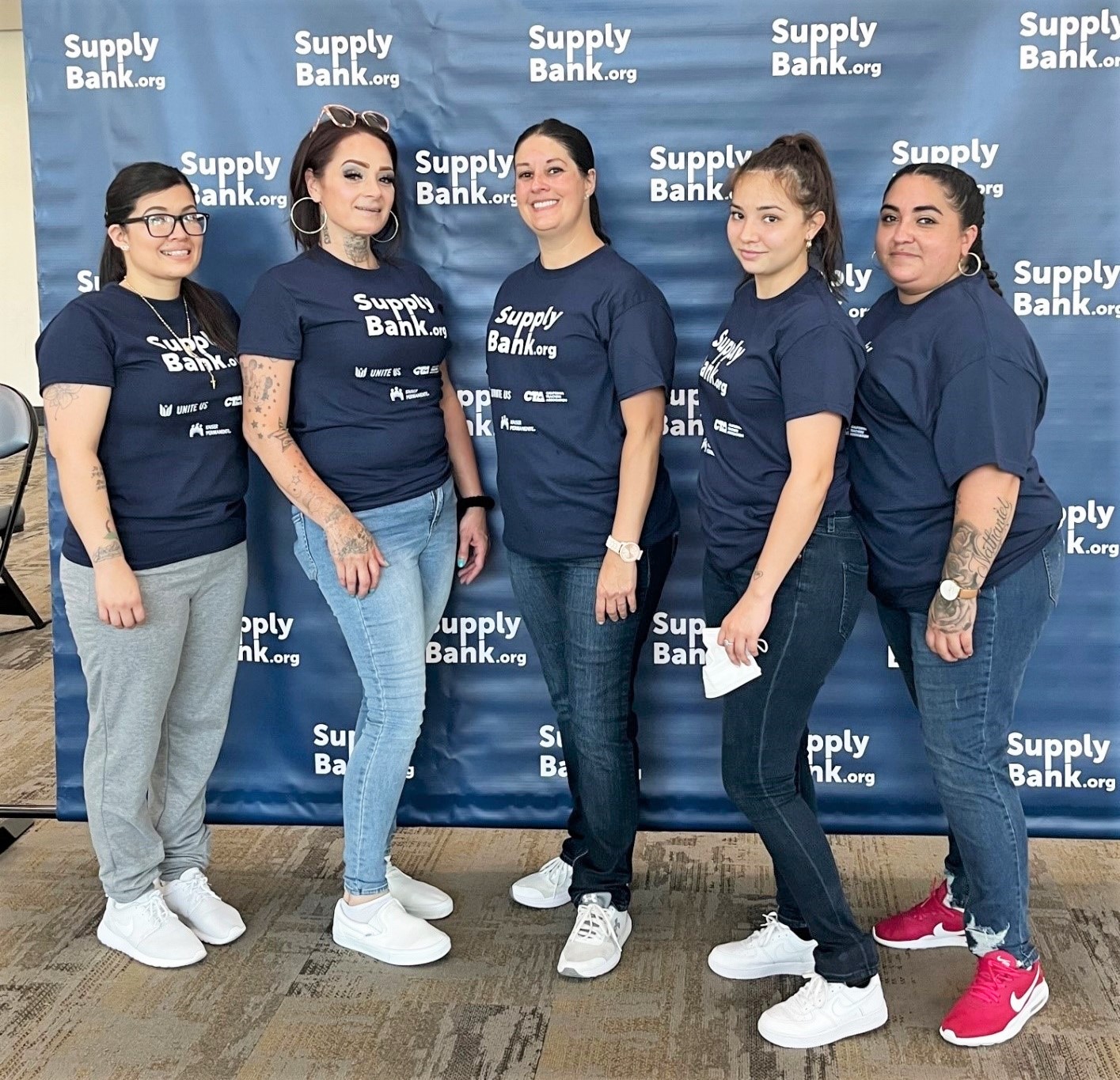 Reentry volunteers help with school supplies