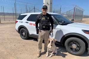 Officer and his K-9 partner at Ironwood State Prison after helping a task force find a hidden cell phone.