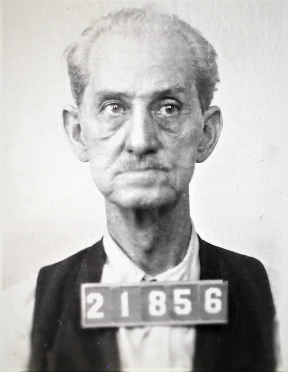 21856 numbers over mugshot of older man William Young.