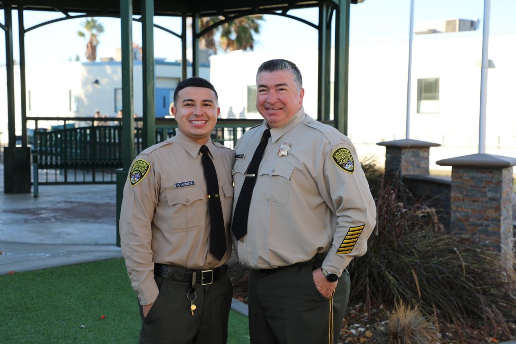 Father and son CDCR officers at the academy graduation.