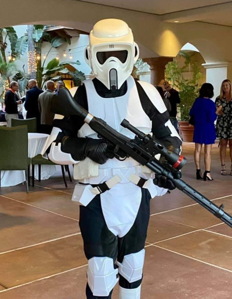 Man wearing Storm Trooper Star Wars costume.